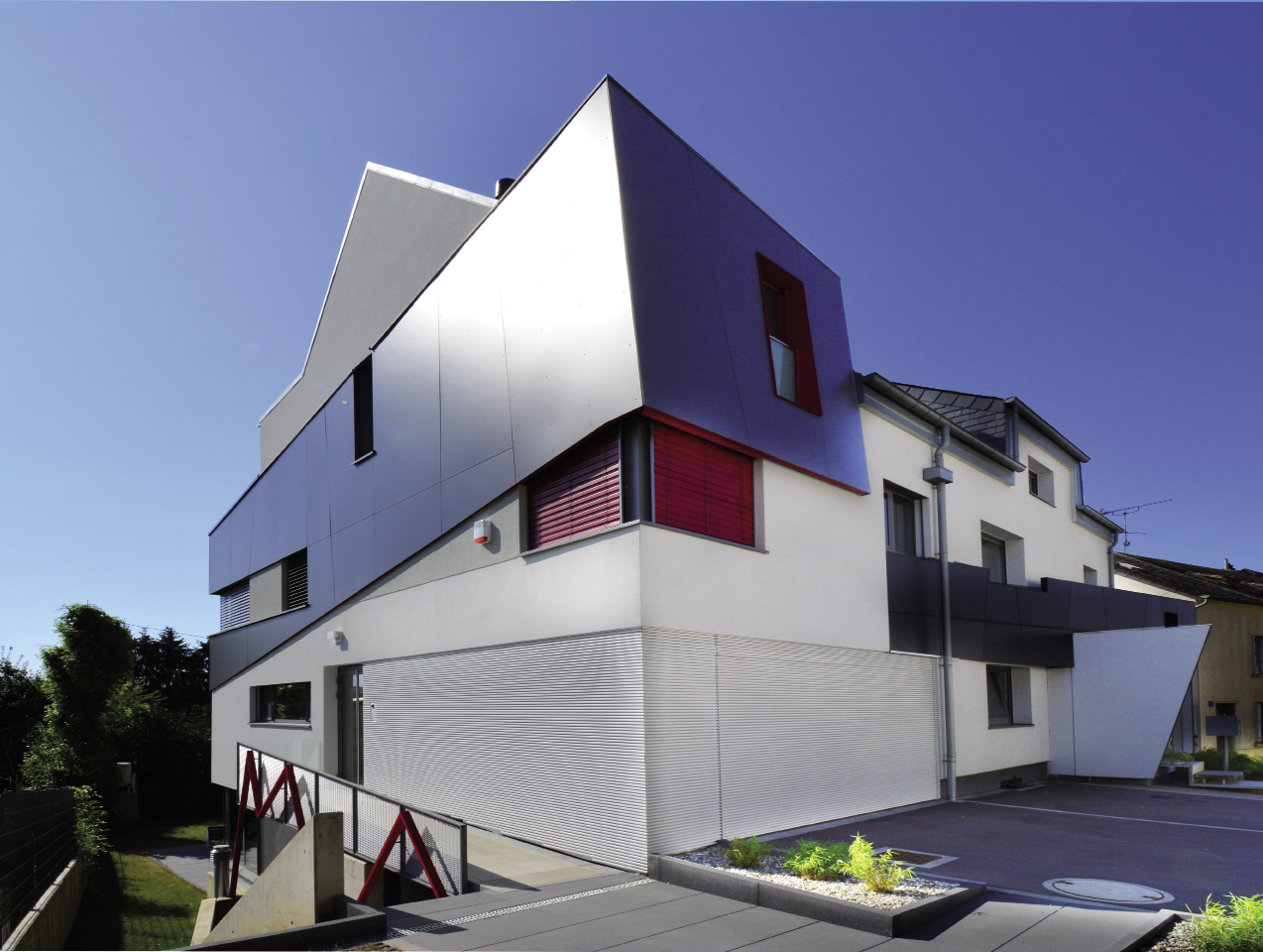 Maison bi-familiale à Hesperange © XXA architecture Sàrl XXA ARCHITECTURE S.à R.L.